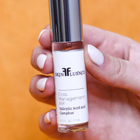 Crisis Management AM with 2% salicylic acid, camphor, and witch hazel for acne spot treatment