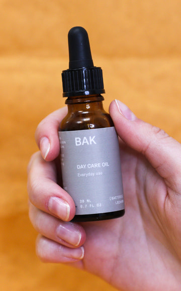 BAK Daily oil with prebiotics, probiotics, Sweet Almond & Jojoba oils, and Vitamin E